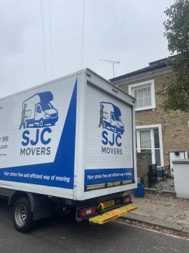 SJC Movers branded Luton van ready for a South London removal