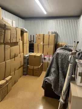 Boxes and furniture kept in a secure storage unit